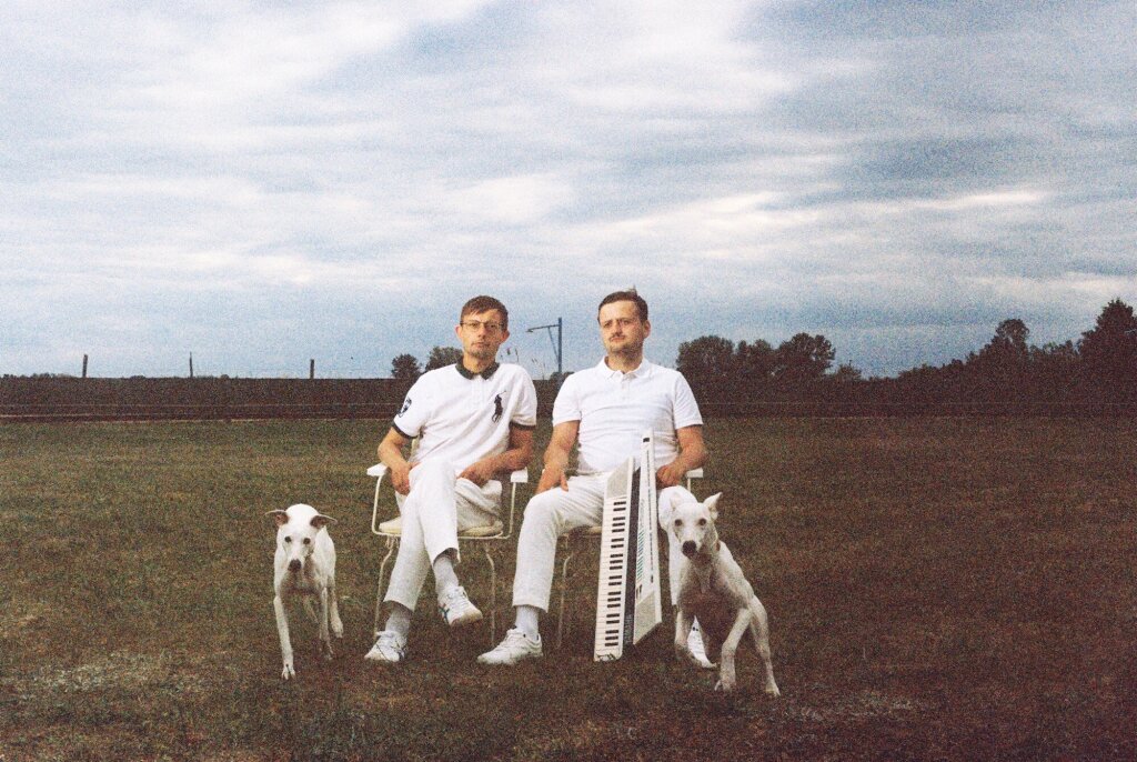 Brigade taking a break on a bench while enjoying the outdoors.